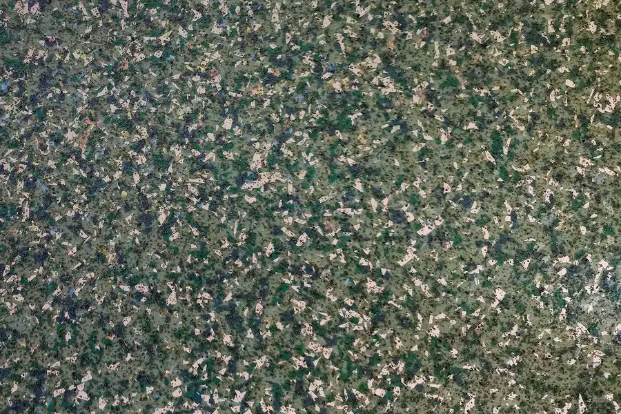 Close up of a vinyl flake epoxy floor finish installed in Pueblo CO