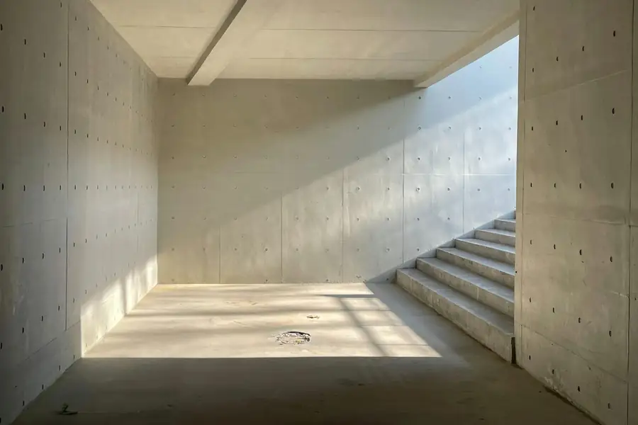 Bare concrete lower level slab in a Pueblo CO home before coating