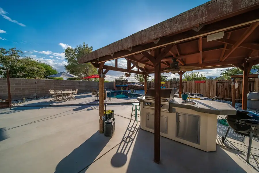 Covered backyard patio over a concrete slab at a Pueblo CO home
